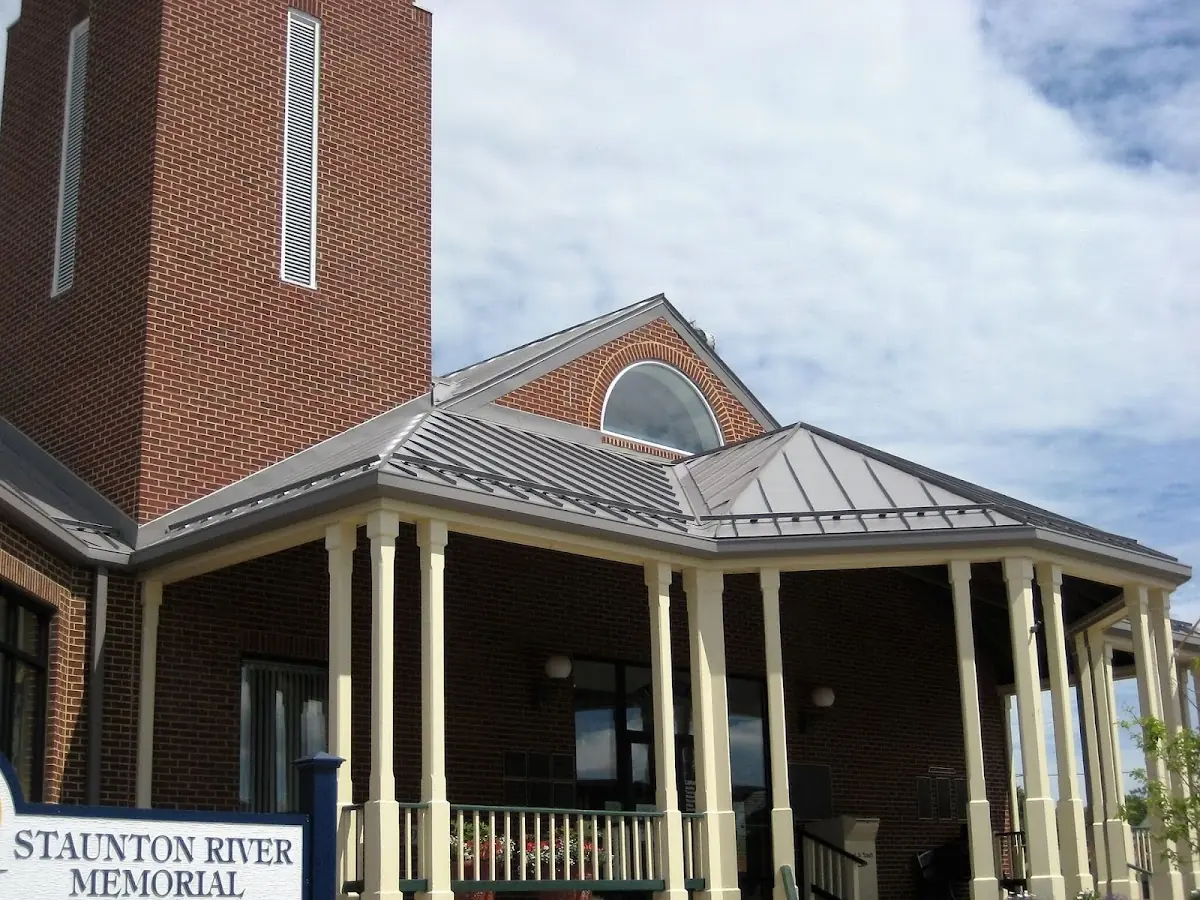 Skilled roofing craftsmen working on a residential roof in West Ocean City